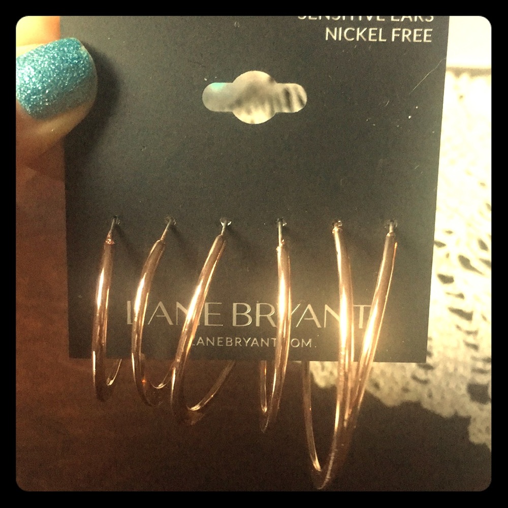 Set of 3 rose gold tone hoop earrings. - Picture 1 of 2